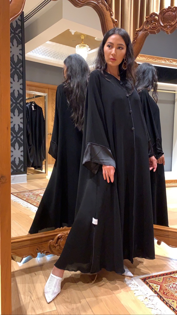 The black silk sleeves with button