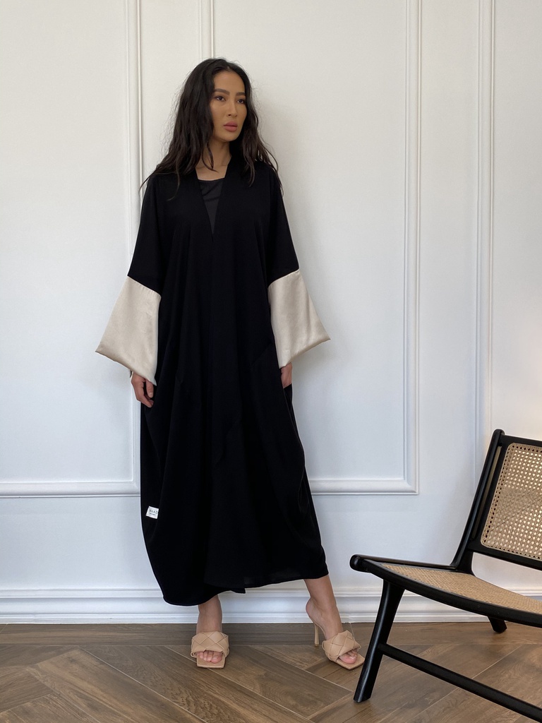 The cream color satin sleeves