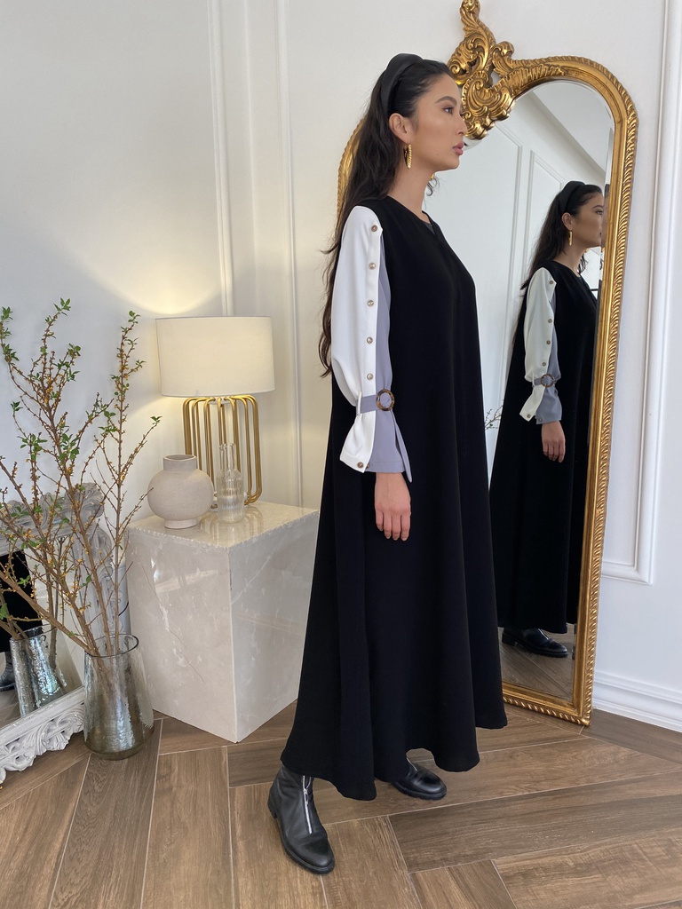 The elaborate buttoned sleeve