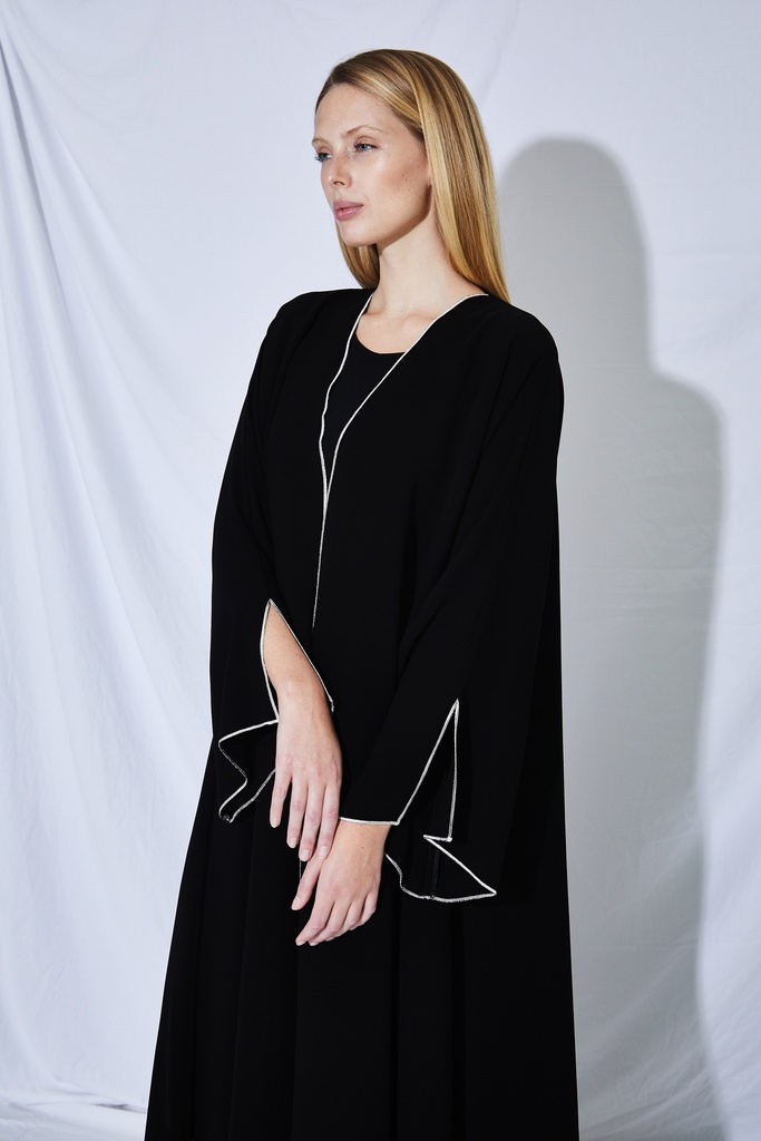 The white overlock trim A-line abaya