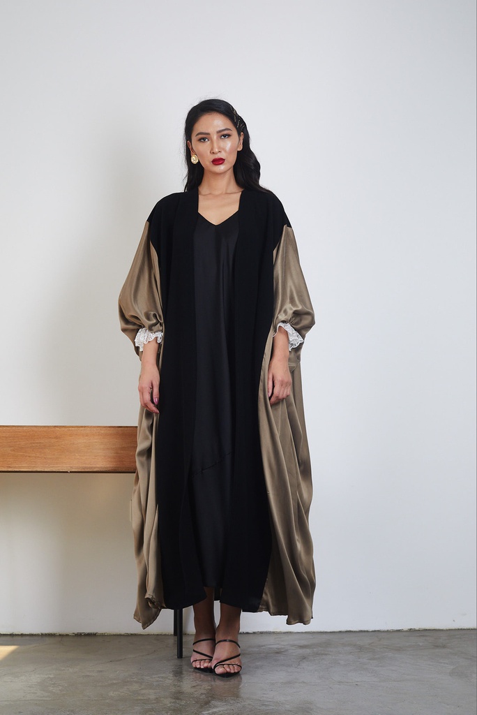 The silk with lace details on the sleeves